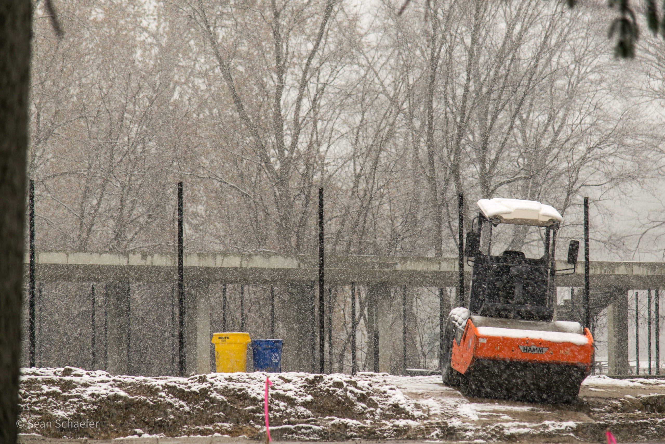 Image of new commercial tennis courts with chain link fencing and posts at Cranbrook Schools