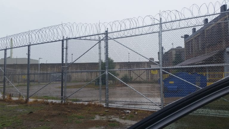 Image of razor ribbon and commercial chain link security fencing at Parnall Correctional Facility