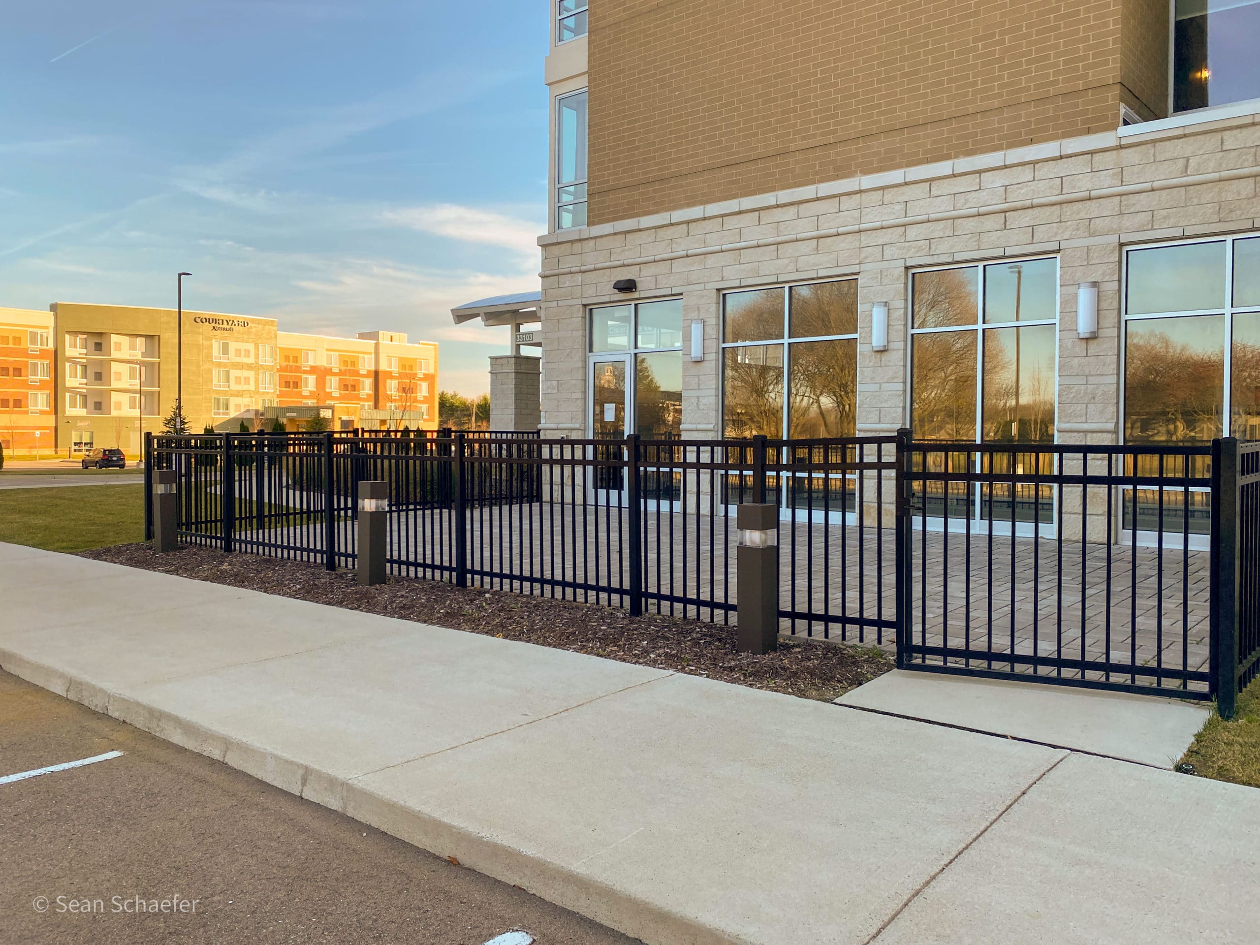 Image of ornamental aluminum picket fencing and swing gates in Metro Detroit, Michigan