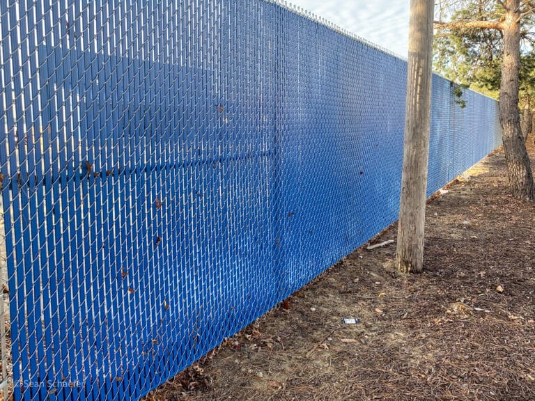 Image of commercial chain link fence with PVC privacy slats in Metro Detroit, Michigan